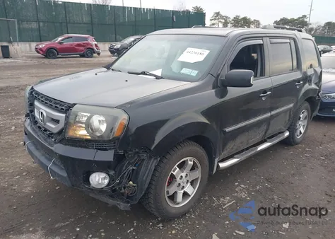 2009 Honda Pilot Touring z USA, uszkodzony, nr VIN 5FNYF489X9B027958